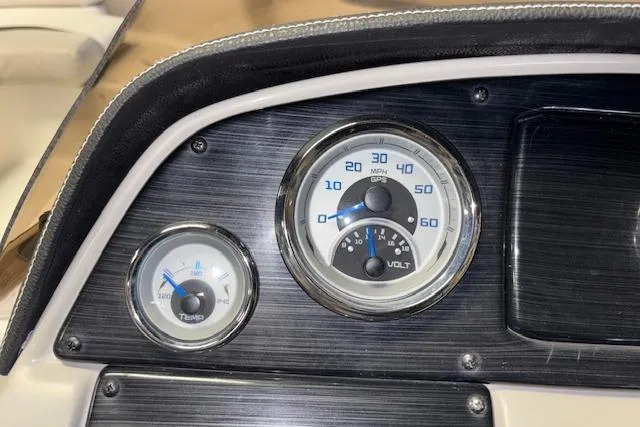 Slide: The Image of Dashboard of 2022 Starcraft Starstep 221 boat with speedometer and voltmeter gauges. - 37