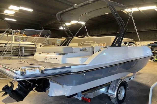 Slide: The Image of 2022 Starcraft Starstep 221 boat on trailer in indoor showroom. - 4