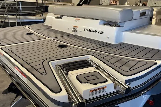 Slide: The Image of 2022 Starcraft Starstep 221 boat deck with seating and swim platform. - 5