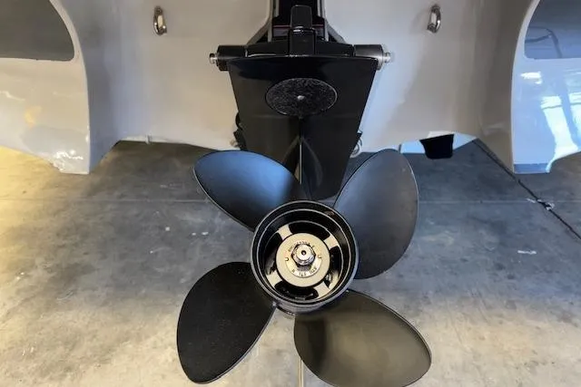 Slide: The Image of Propeller of 2022 Starcraft Starstep 221 boat in a garage setting. - 7