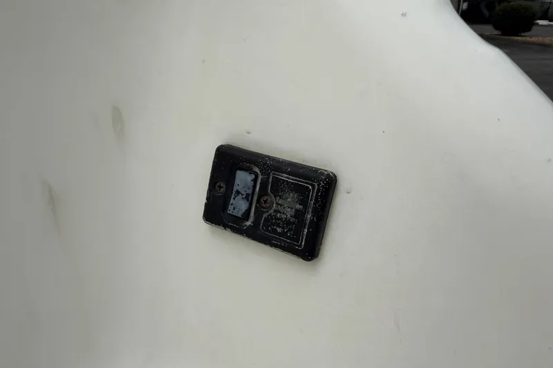 Slide: The Image of Close-up of a 1995 Sea Ray 220 Cuddy Cabin boat's identification plate. - 32