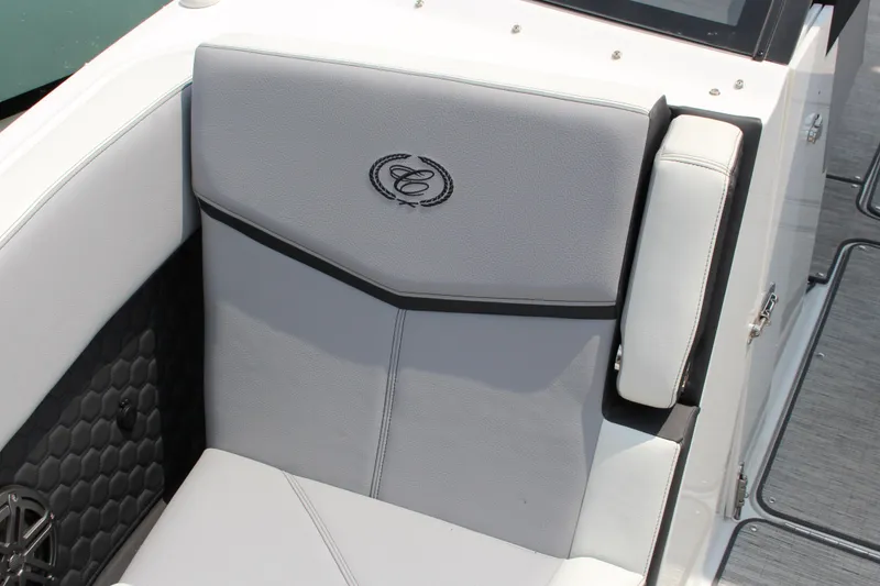 Slide: The Image of 2025 Cobalt R8 Surf boat seat with elegant gray upholstery and logo detailing. - 26