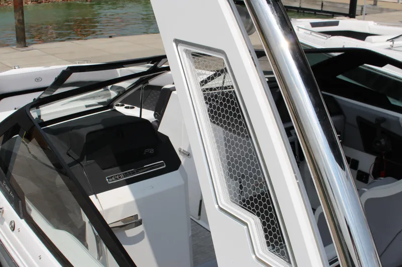 Slide: The Image of 2025 Cobalt R8 Surf boat interior with sleek design and modern features. - 36