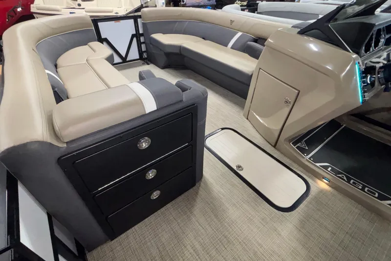 Slide: The Image of Luxurious interior of 2026 Viaggio Z24U boat with beige seating and storage compartments. - 21