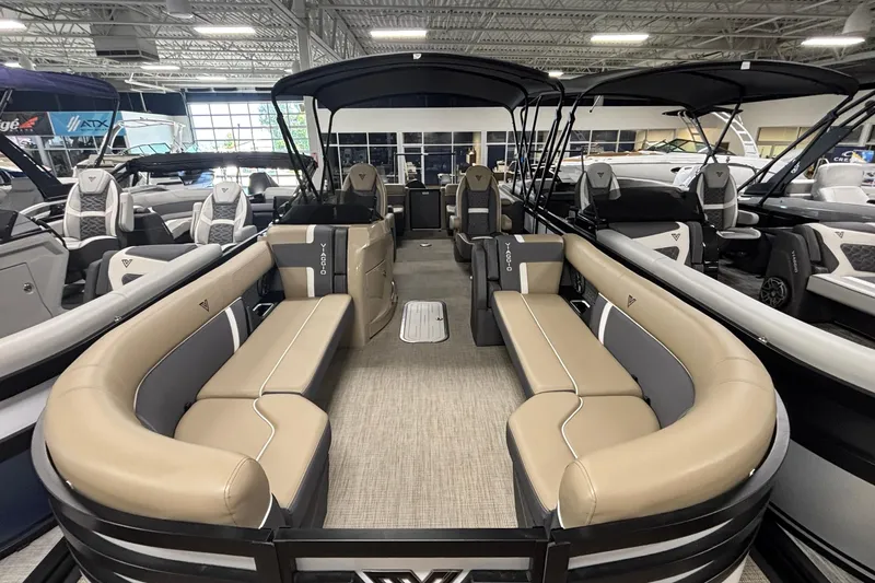 Slide: The Image of Luxurious 2026 Viaggio Z24U pontoon boat interior with beige seating and modern design. - 3