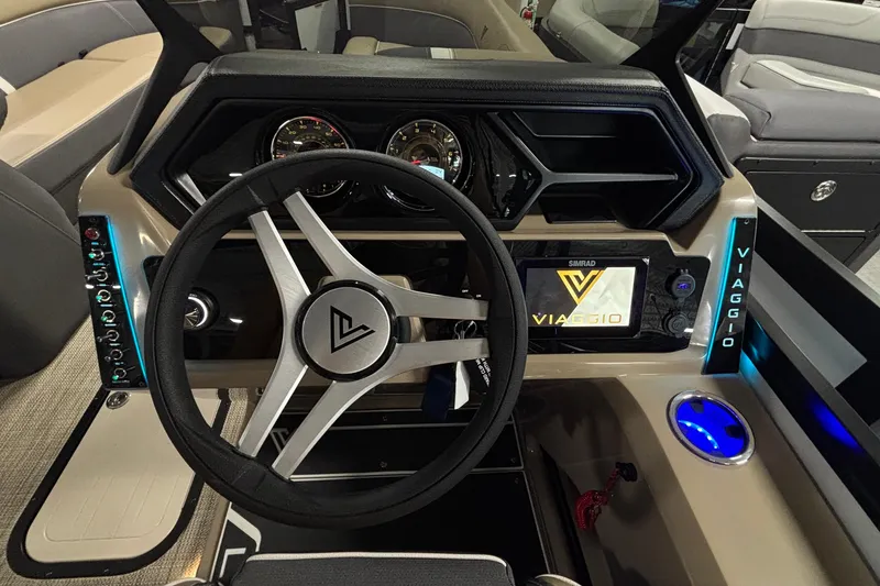 Slide: The Image of Viaggio Z24U 2026 dashboard with steering wheel, digital display, and illuminated controls. - 10