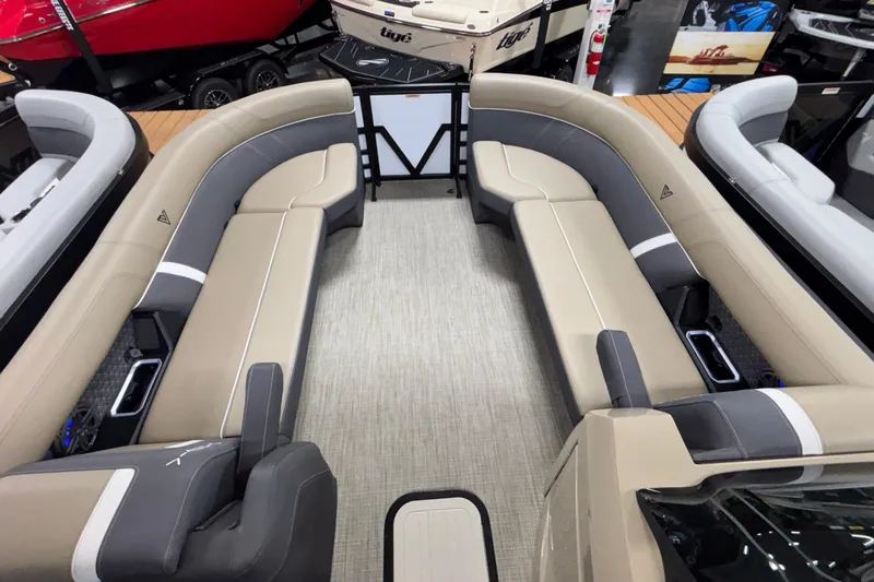 Slide: The Image of Luxurious seating area on a 2026 Viaggio Z24U boat, featuring beige and gray upholstery. - 19