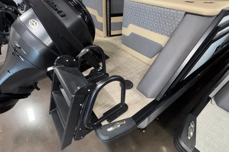 Slide: The Image of 2026 Viaggio Z24U boat with motor and foldable ladder, featuring modern seating and flooring. - 6