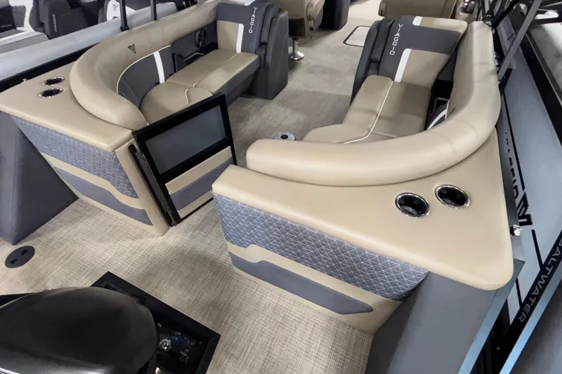 Slide: The Image of Luxurious interior of 2026 Viaggio Z24U boat with beige seating and cup holders. - 8