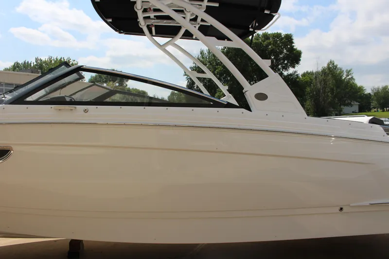 Slide: The Image of 2025 Cobalt R8 boat side view with sleek design and modern features. - 11