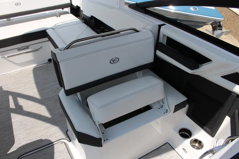 Slide: The Image of 2025 Cobalt R8 boat interior with white seating and modern design features. - 8