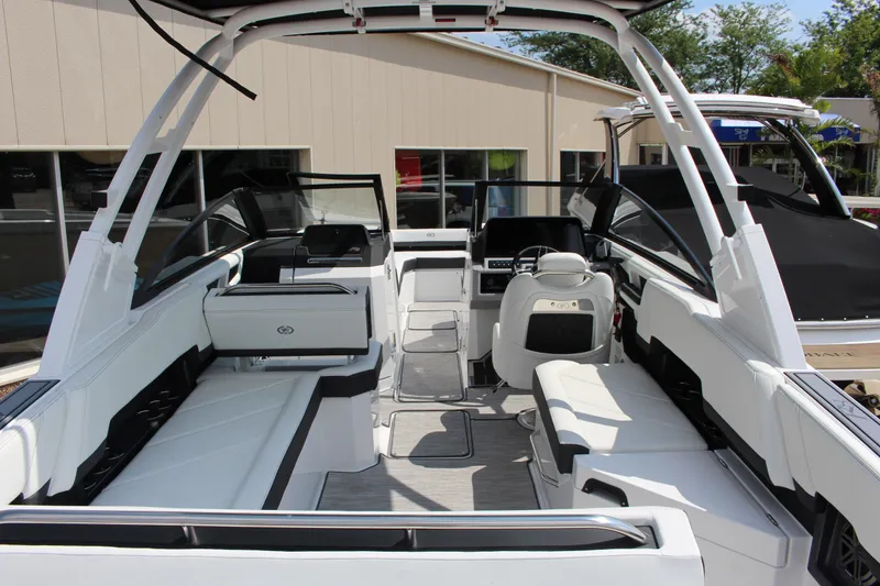 Slide: The Image of 2025 Cobalt R8 boat interior with modern seating and sleek design. - 9