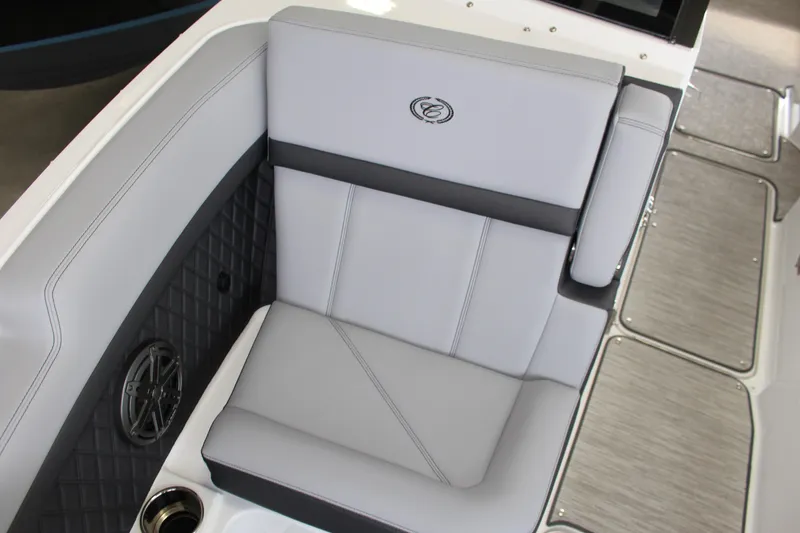 Slide: The Image of 2025 Cobalt R8 boat interior with luxurious gray seating and speaker detail. - 10