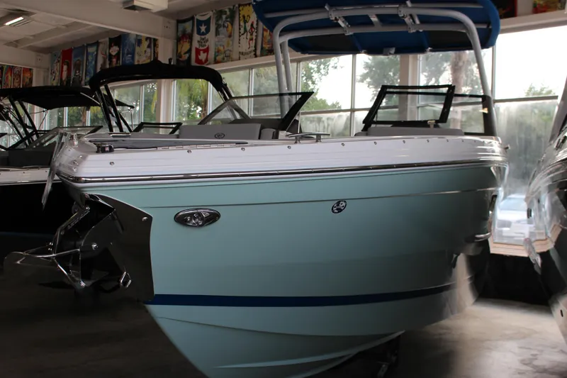 Slide: The Image of 2025 Cobalt R8 boat in showroom, featuring sleek design and modern amenities. - 31
