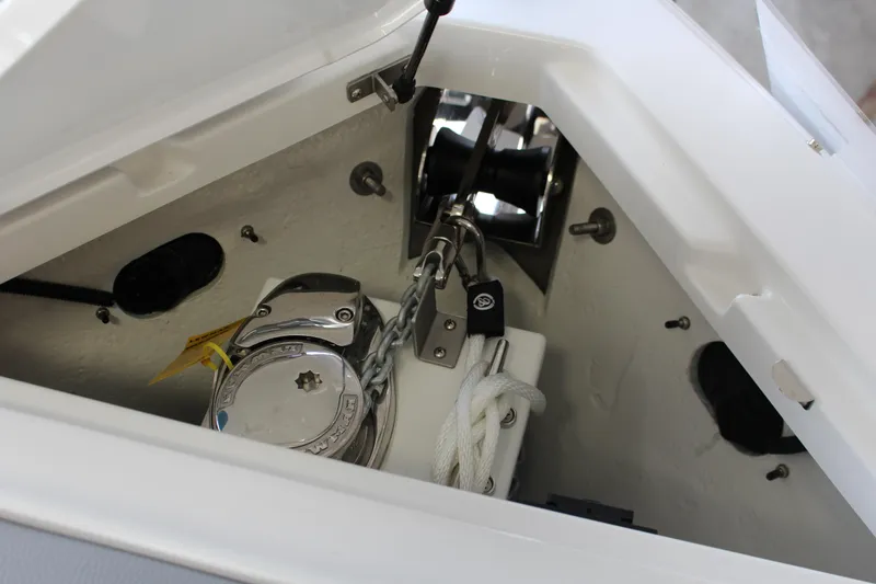 Slide: The Image of Anchor compartment of 2025 Cobalt R8 boat with chain and winch. - 9