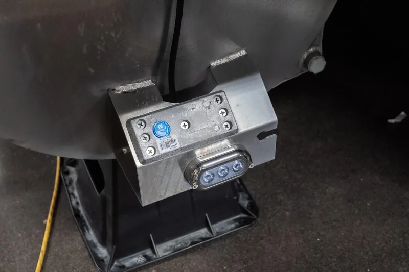 Slide: The Image of Close-up of Viaggio D22U 2026 vehicle component with metal bracket and wiring. - 10