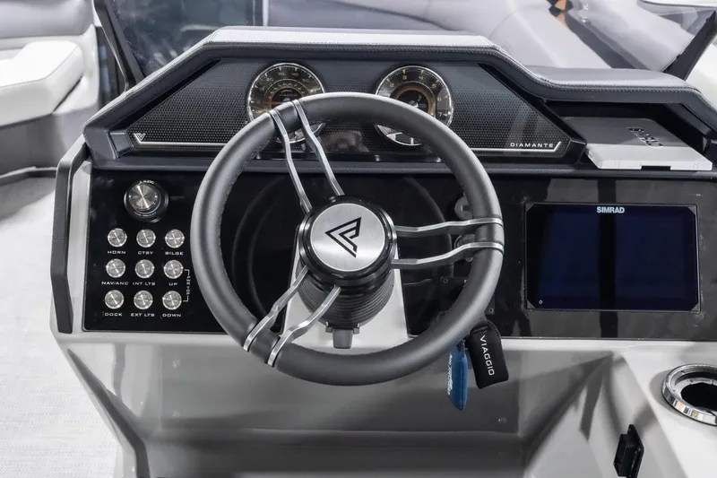Slide: The Image of Steering console of 2026 Viaggio D22U boat with modern controls and display. - 22