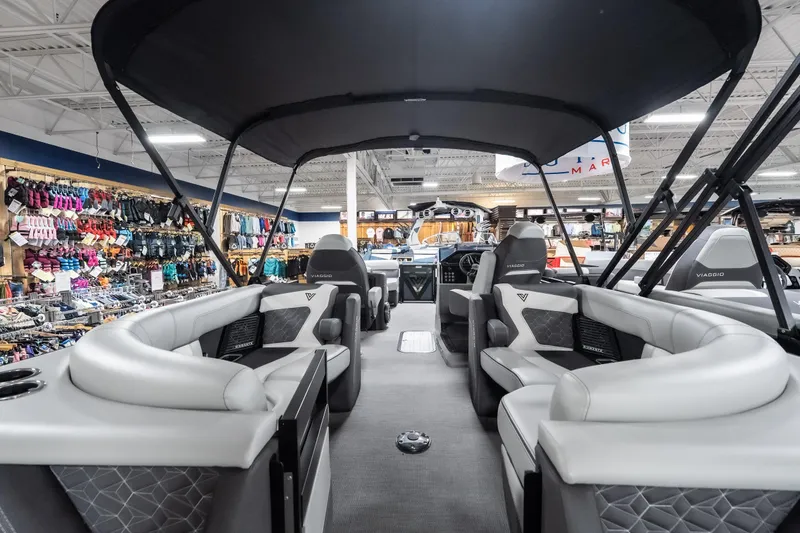 Slide: The Image of Interior view of 2026 Viaggio D22U boat in a showroom setting. - 28