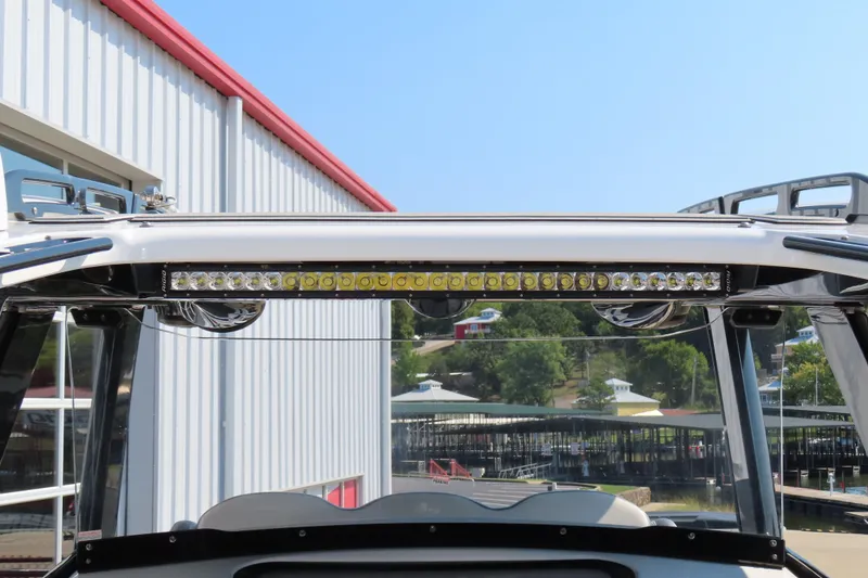 Slide: The Image of 2021 Sunsation 34 CCX boat with LED light bar and sleek design. - 12