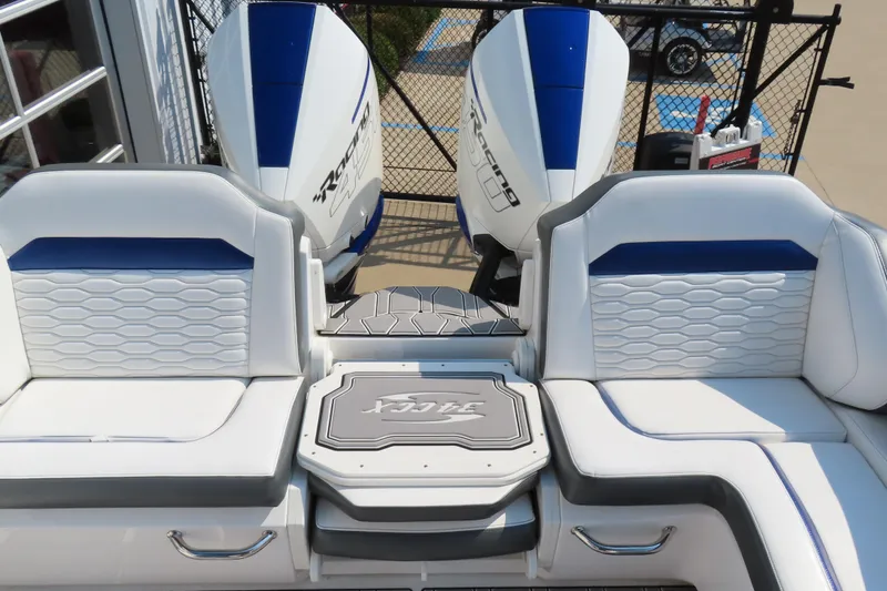 Slide: The Image of 2021 Sunsation 34 CCX boat interior with dual engines and stylish seating. - 20