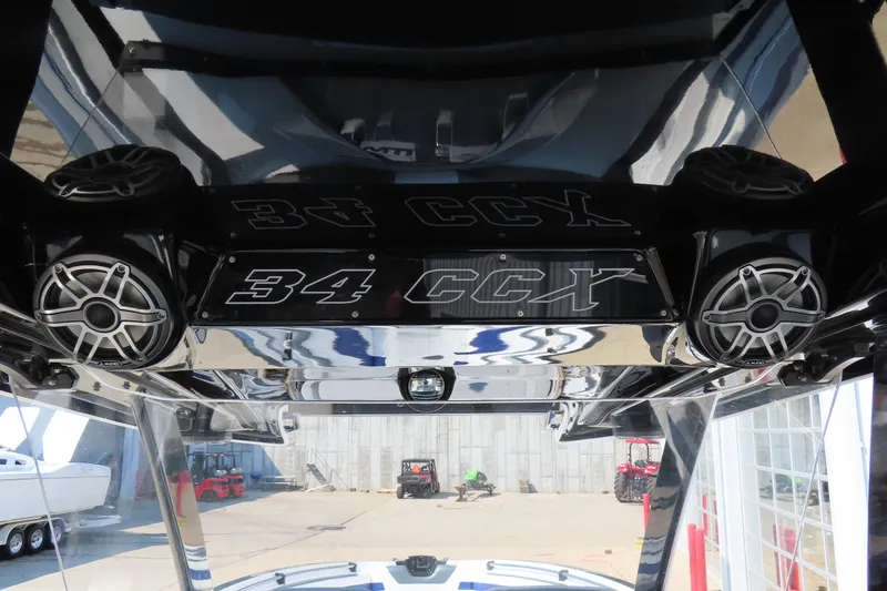 Slide: The Image of 2021 Sunsation 34 CCX boat interior with speakers and model branding. - 22