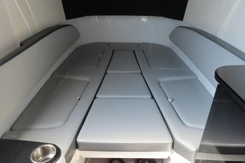 Slide: The Image of 2021 Sunsation 34 CCX cabin interior with cushioned seating and modern design. - 24