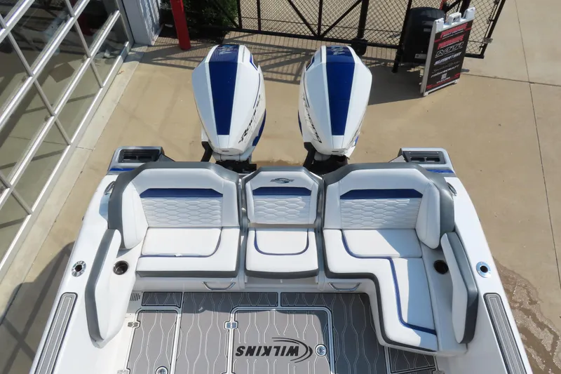 Slide: The Image of 2021 Sunsation 34 CCX boat with dual engines and stylish seating arrangement. - 8