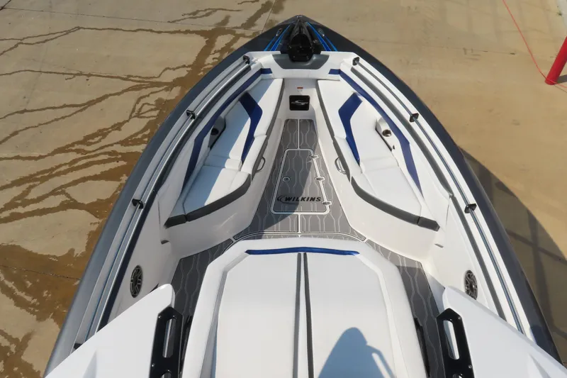 Slide: The Image of 2021 Sunsation 34 CCX boat interior with sleek seating and modern design. - 9