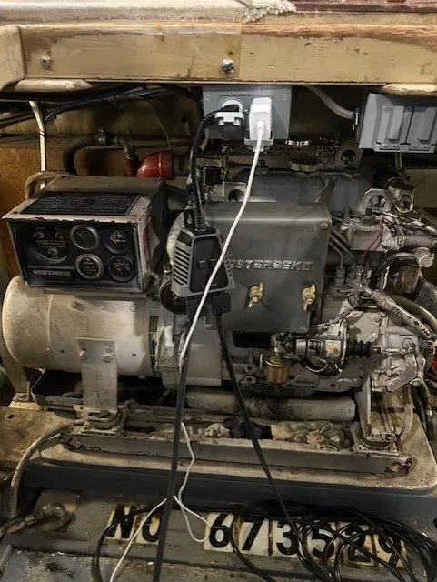Slide: The Image of Engine room of a 1984 Post 43 Sport Fisherman boat with Westerbeke generator. - 17