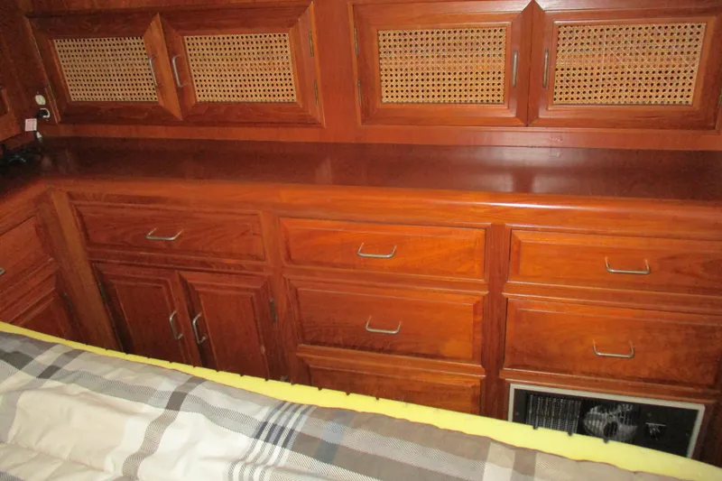 Slide: The Image of Wooden cabinetry in 1986 Ocean Alexander 40 Double Cabin interior, featuring drawers and woven panel doors. - 32