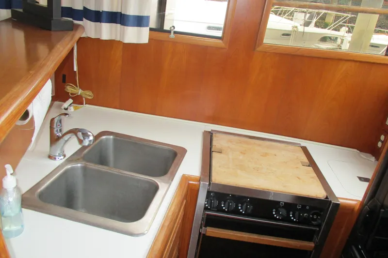 Slide: The Image of Kitchen area of the 1986 Ocean Alexander 40 Double Cabin. - 39