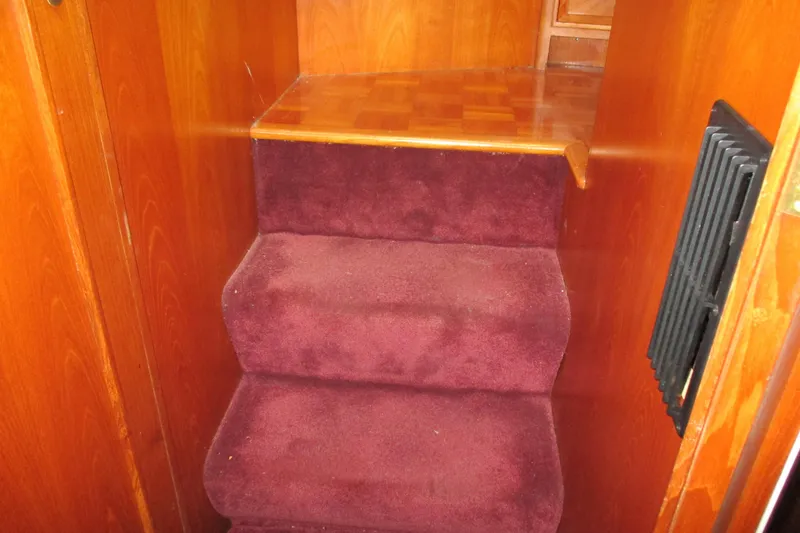 Slide: The Image of Carpeted stairs in 1986 Ocean Alexander 40 Double Cabin. - 40