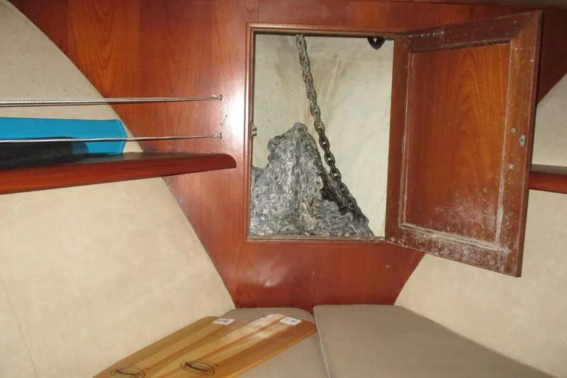 Slide: The Image of Interior of 1986 Ocean Alexander 40 Double Cabin with anchor chain storage. - 43