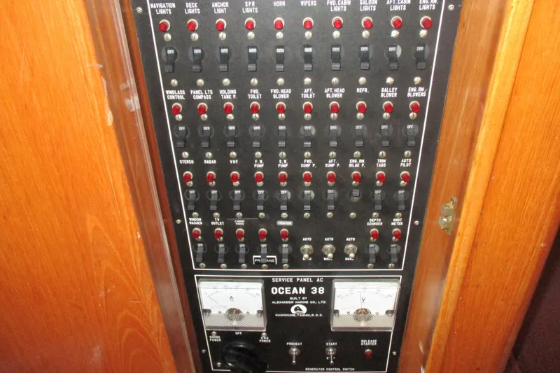 Slide: The Image of Electrical control panel on a 1986 Ocean Alexander 40 Double Cabin yacht. - 45