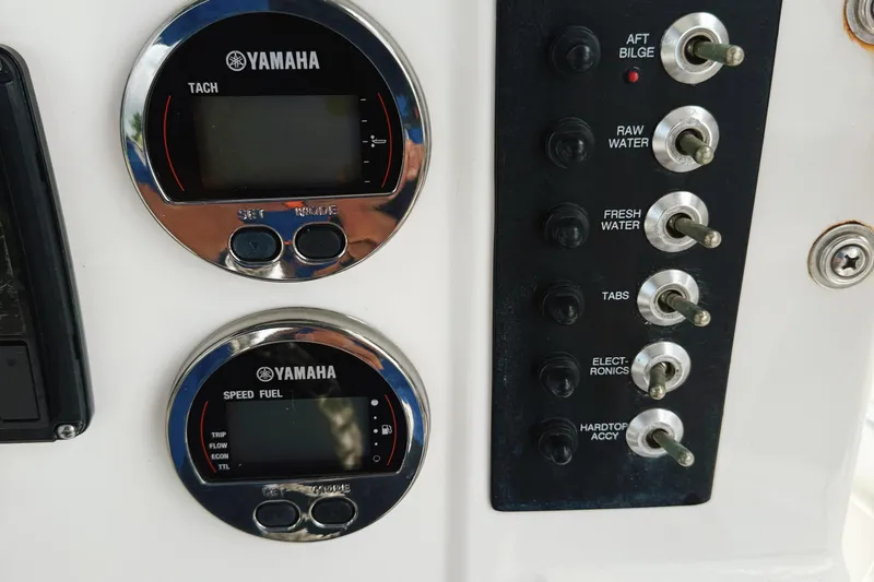 Slide: The Image of Control panel of 2016 Robalo R222 Center Console with Yamaha gauges and switches. - 10
