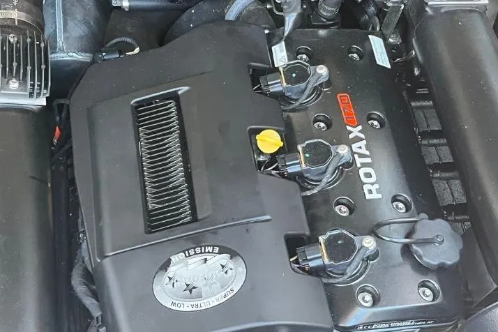 Slide: The Image of Engine of 2022 Scarab 215 SE with Rotax branding, showcasing components and design. - 17