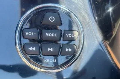 Slide: The Image of Control panel of 2022 Scarab 215 SE with volume and mode buttons. - 22