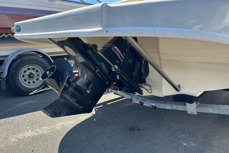 Slide: The Image of Rear view of a 2000 Sea Ray 185 Bow Rider boat on a trailer. - 15