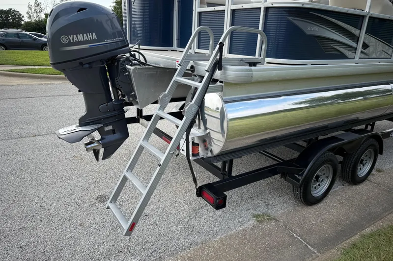 Slide: The Image of Close-up of a 2018 Sweetwater Sunrise 206 F tire on asphalt. - 28