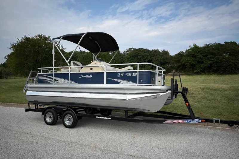 Slide: The Image of 2018 Sweetwater Sunrise 206 F pontoon boat on trailer, side view. - 30