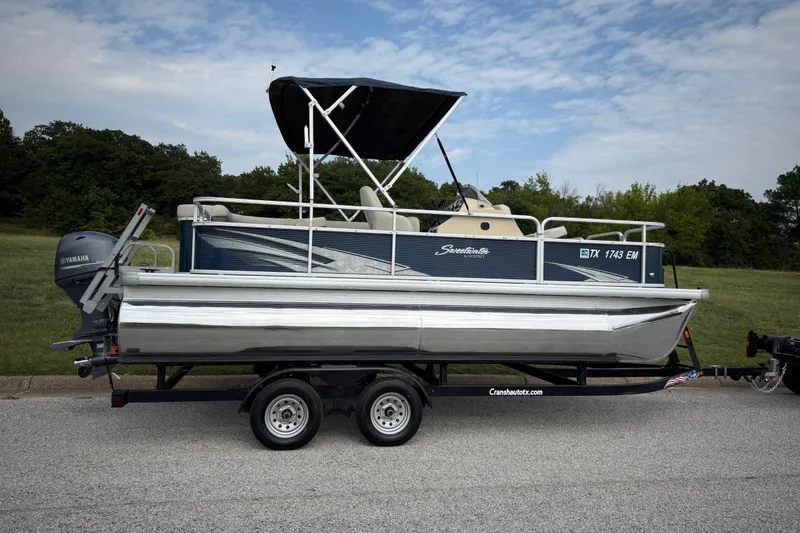 Slide: The Image of 2018 Sweetwater Sunrise 206 F pontoon boat with 70 HP outboard motor on trailer. - 33