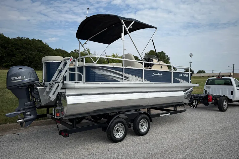 Slide: The Image of 2018 Sweetwater Sunrise 206 F pontoon boat with Yamaha motor on a trailer. - 35