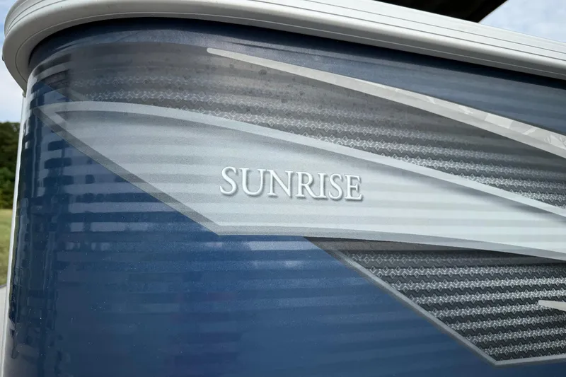 Slide: The Image of 2018 Sweetwater Sunrise 206 F boat with Yamaha 70 engine and ladder on trailer. - 42