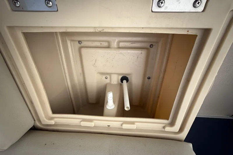 Slide: The Image of 2018 Sweetwater Sunrise 206 F boat interior with seating and storage. - 67