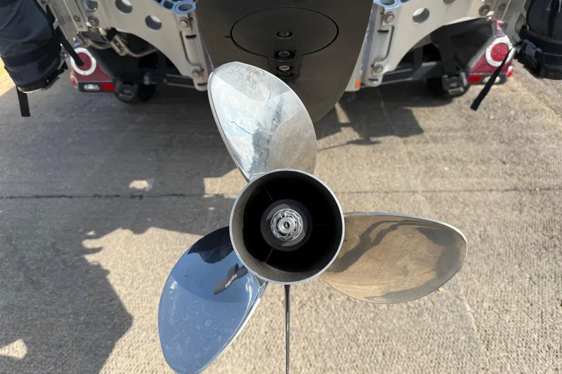 Slide: The Image of 2014 Ranger Z520 Comanche boat on trailer, parked outdoors. - 31