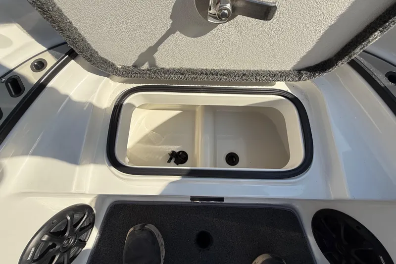 Slide: The Image of 2014 Ranger Z520 Comanche boat at dock, featuring dual seats and sleek design. - 46