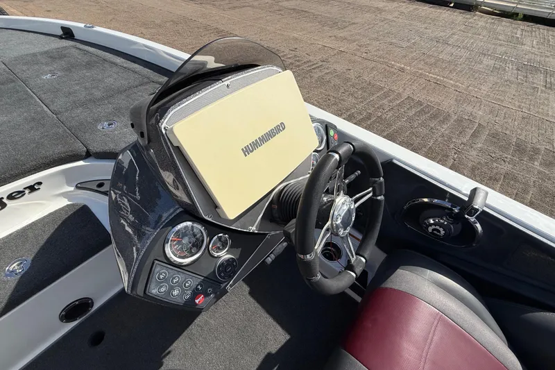 Slide: The Image of 2014 Ranger Z520 Comanche boat storage compartments open on deck. - 54