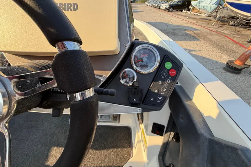 Slide: The Image of 2014 Ranger Z520 Comanche livewell compartment with open lid, showcasing interior details. - 65