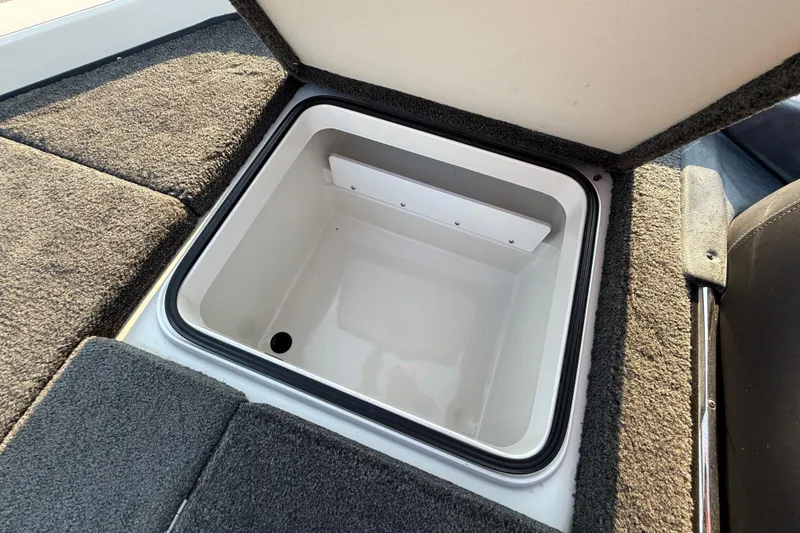 Slide: The Image of 2014 Ranger Z520 Comanche battery compartment with NOCO Genius charger and Interstate battery. - 70