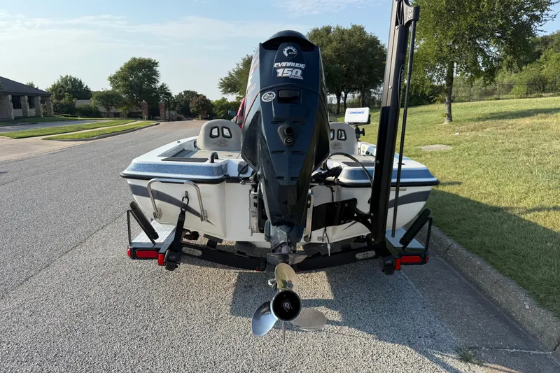 Slide: The Image of 2008 Bee Line 286 Pro Vee boat with Evinrude 150 engine on a trailer. - 11